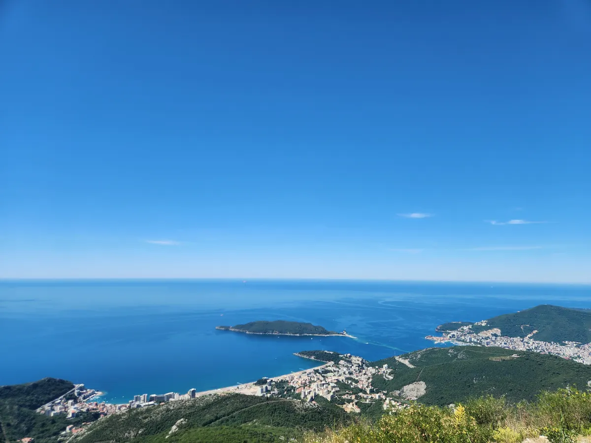 Aerial view of a coastal Balkan town and harbor